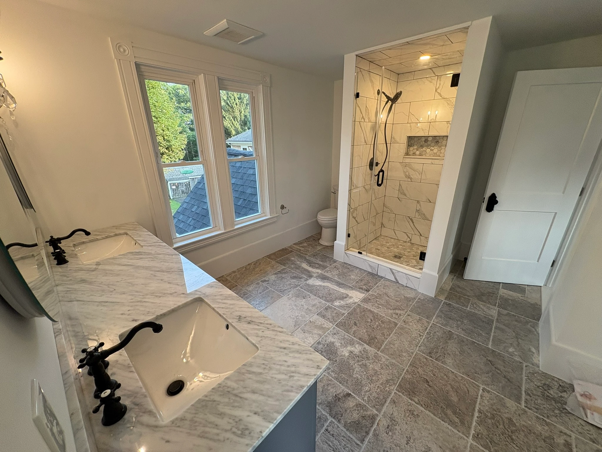 Marble countertop and glass shower