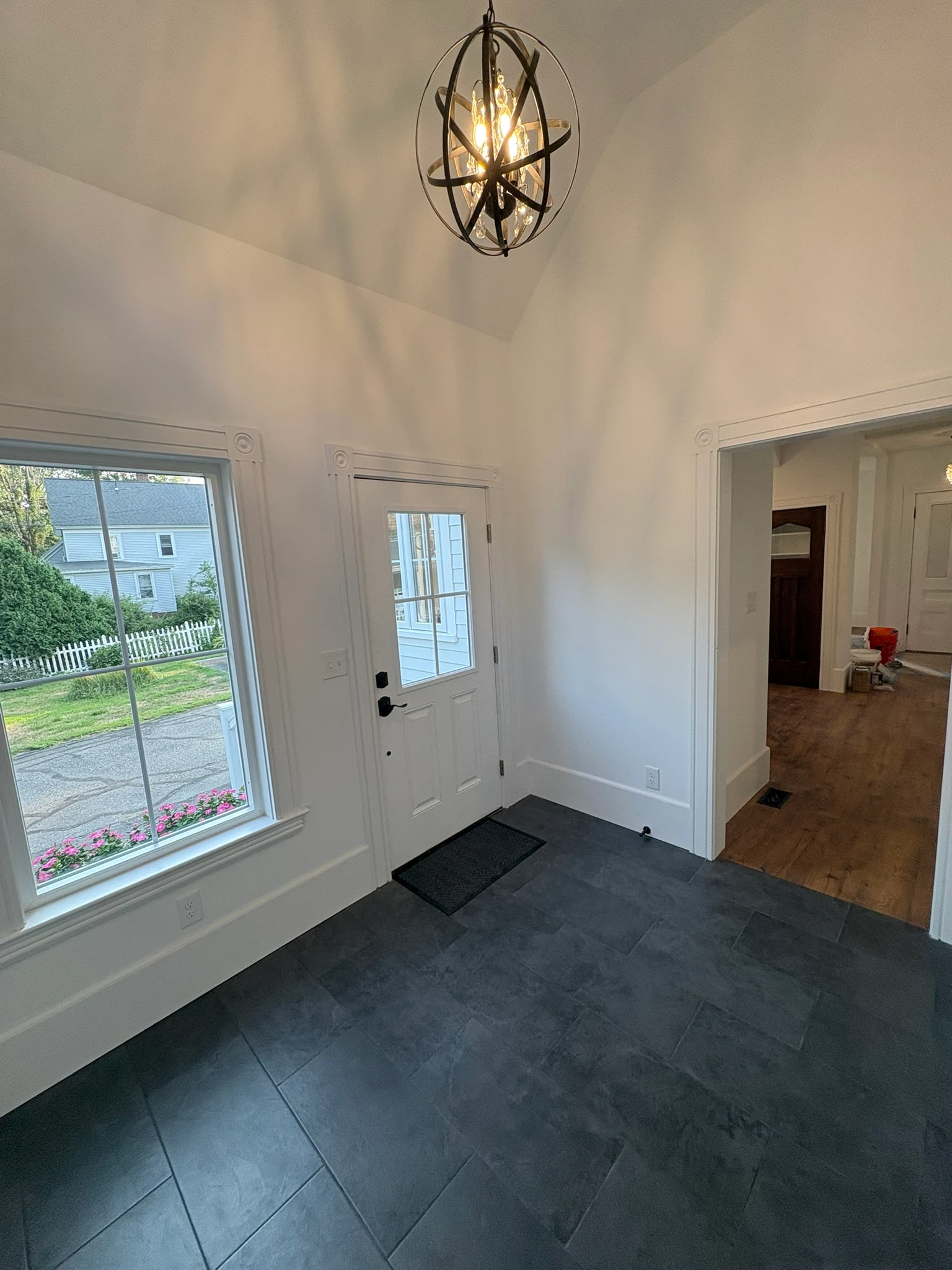 The finished front door, light beyond the glass